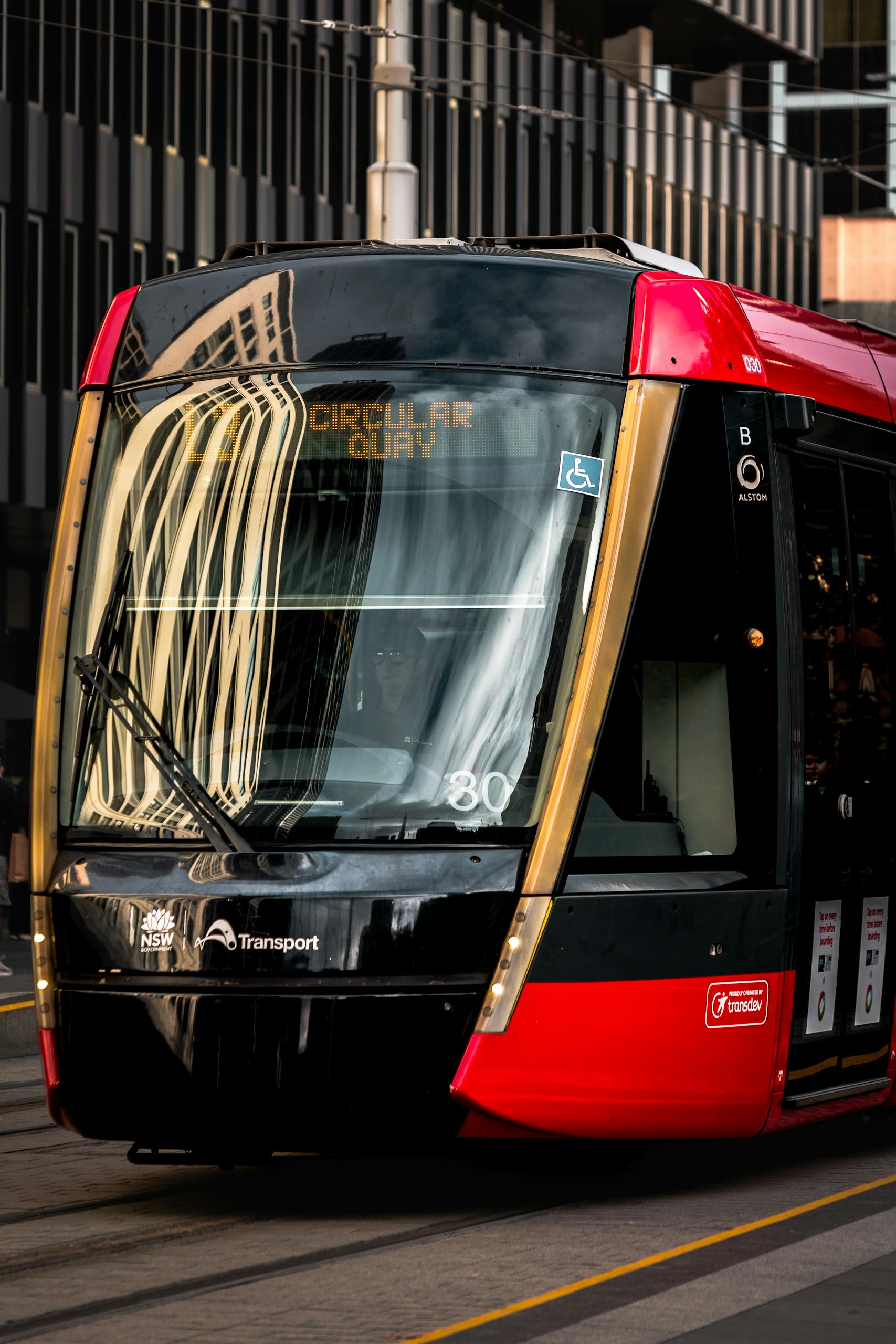 dynamic urban scene with a light rail train in sydney australia. 32459832 scaled